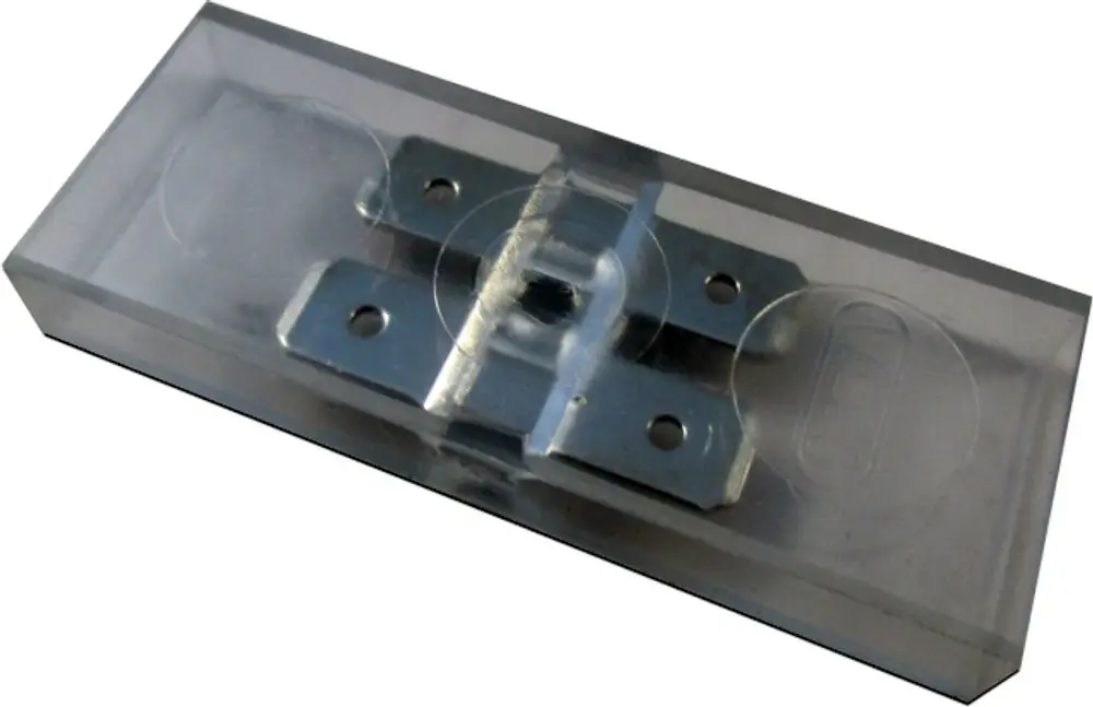 Steckerverbinder in durchsichtiger Verpackung, gefertigt von Wolf, mit zwei metallischen Klemmen zur elektrischen Verbindung.
